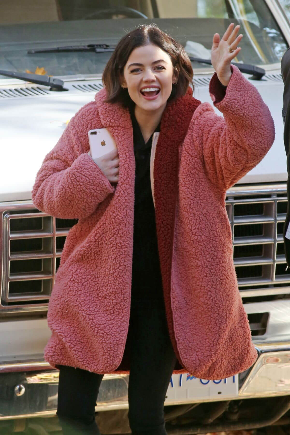 Lucy Hale wears Red Long Winter Jacket on the Set of Life Sentence in Vancouver