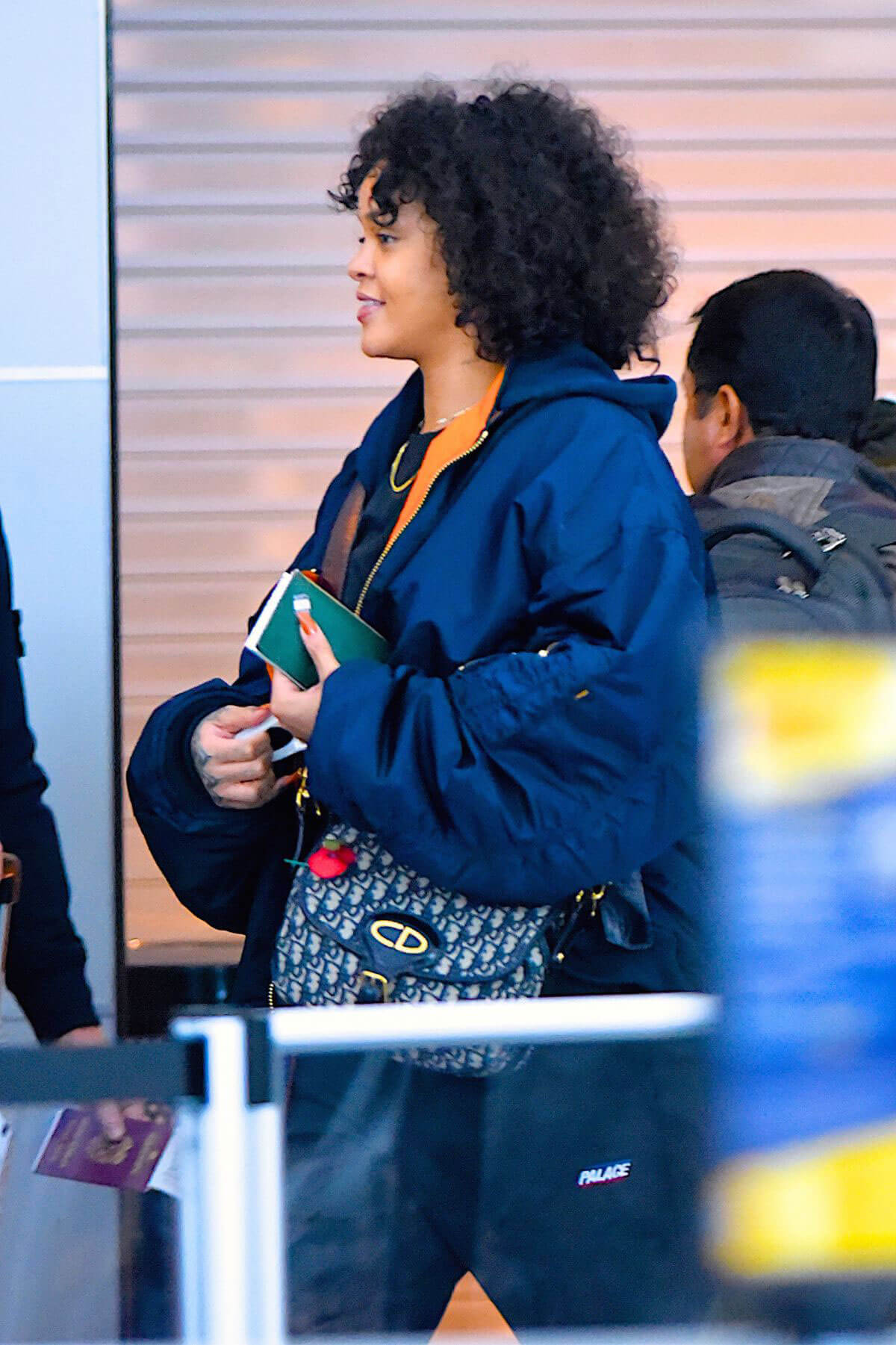 Rihanna wears Blue Jacket at JFK Airport in New York