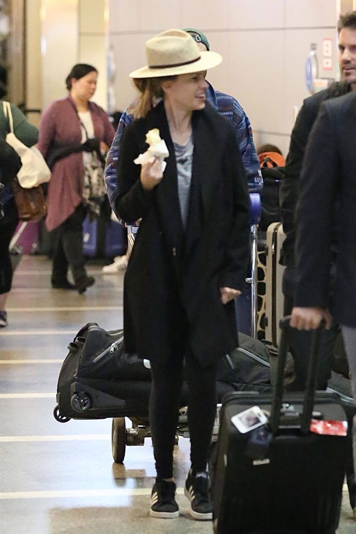 Hilary Swank and Philip Schneider Stills at LAX Airport in Los Angeles 2017/12/17