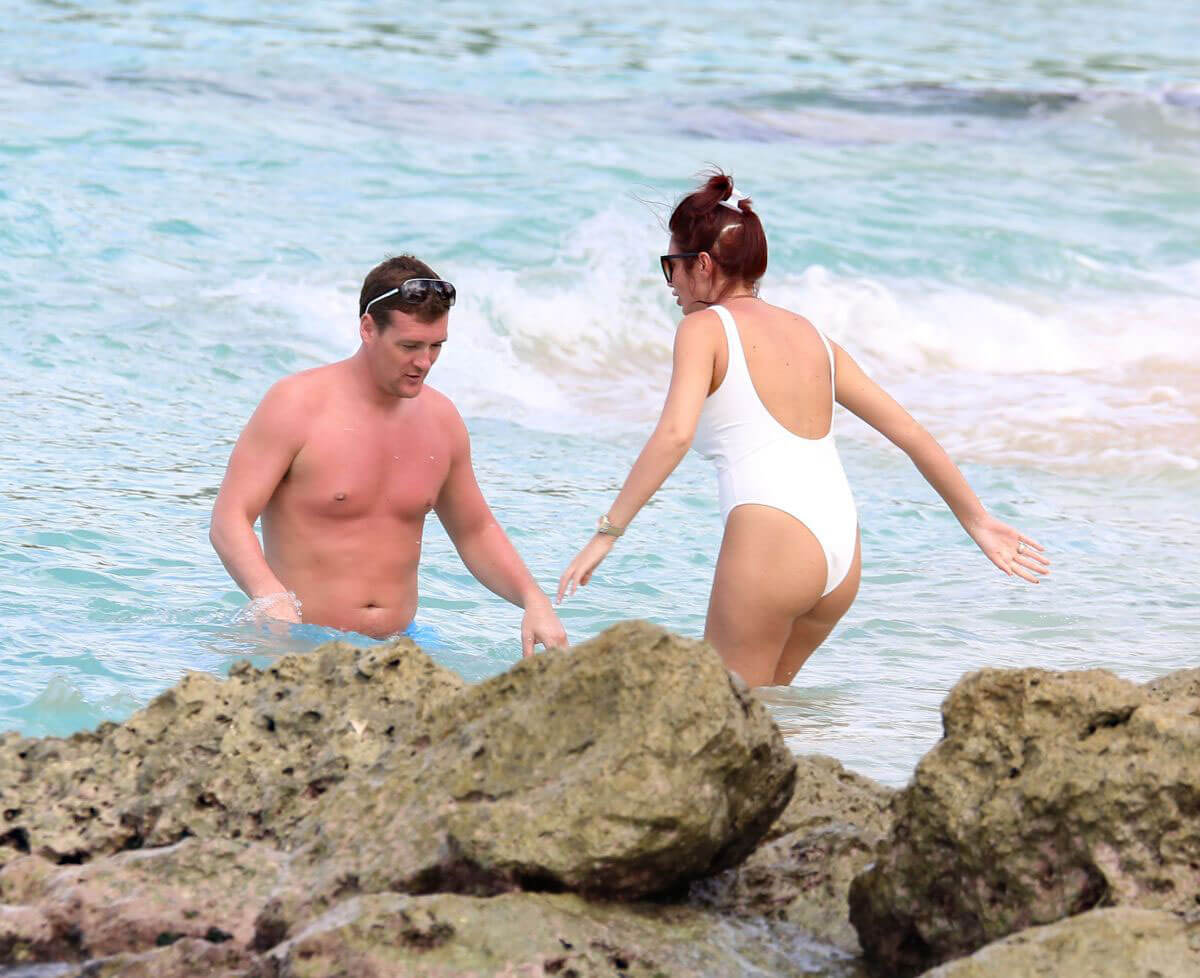 Amy Childs Stills in Swimsuit at a Beach in Barbados 2018/01/31