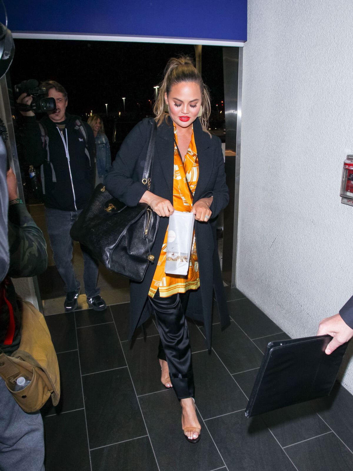 Chrissy Teigen Stills at LAX Airport in Los Angeles 2018/02/24