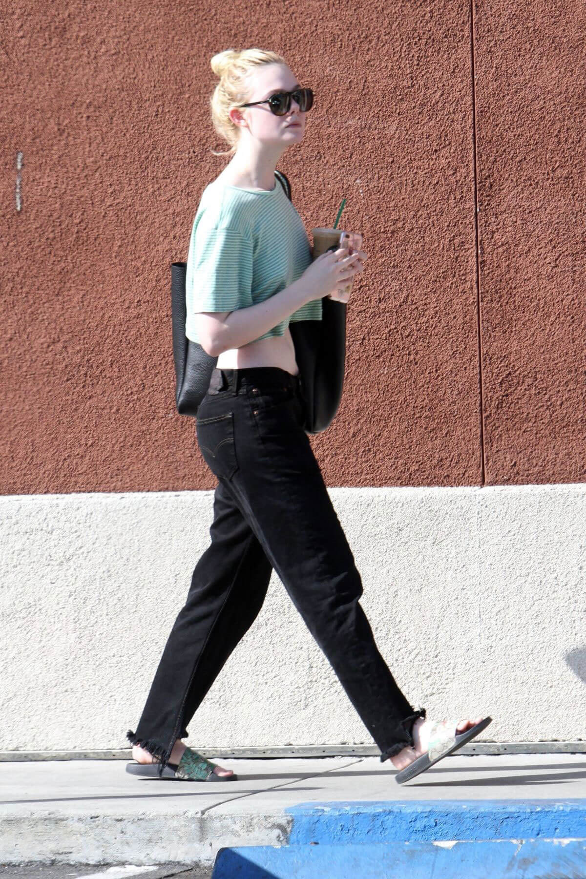 Elle Fanning Stills Out for Iced Latte at Starbucks in Studio City 2018/02/06