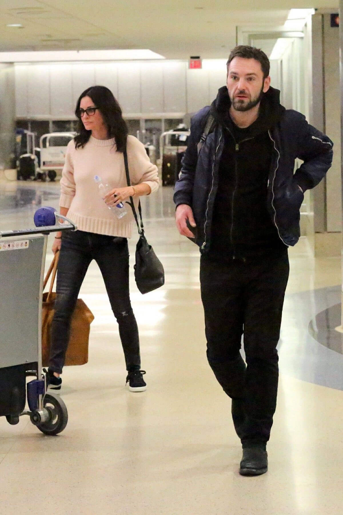 Courteney Cox and Johnny McDaid Stills at LAX Airport in Los Angeles 2018/04/20