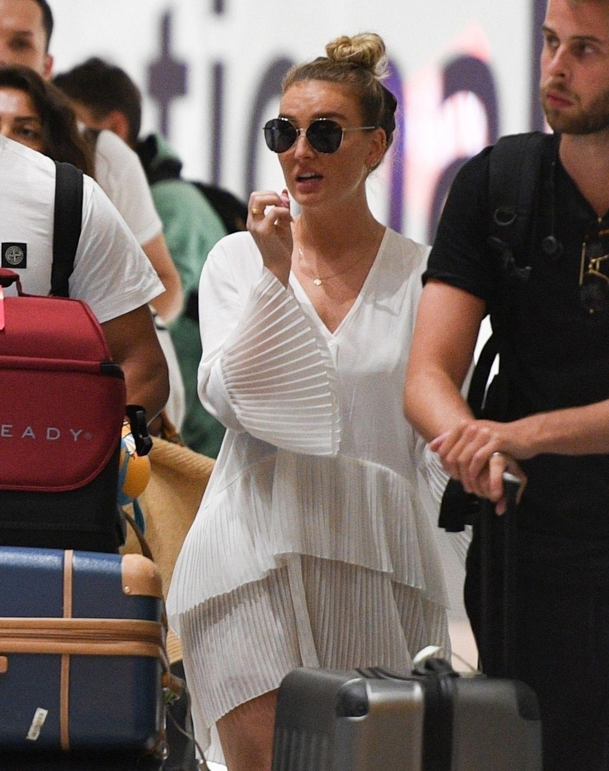 Perrie Edwards at Heathrow Airport in London 2018/08/12