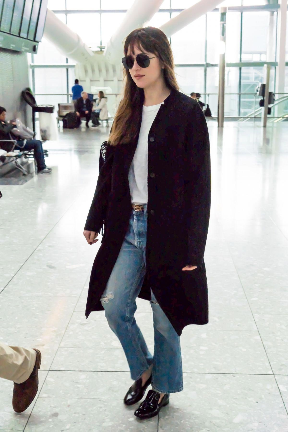 Dakota Johnson at Heathrow Airport in London 2018/10/17