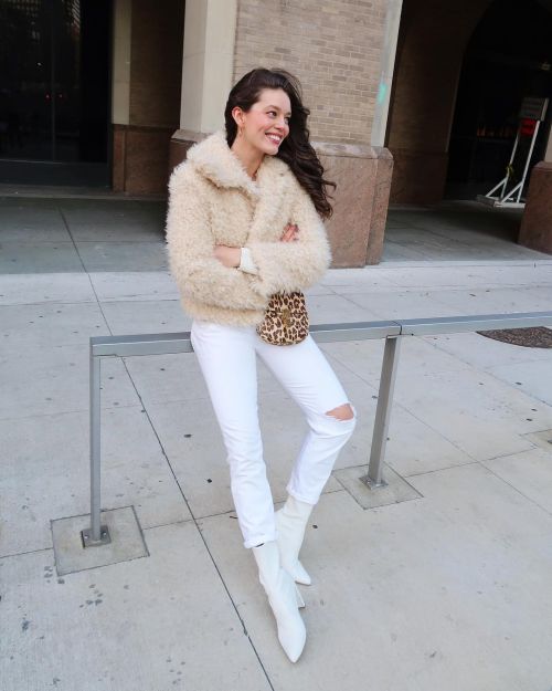 Emily DiDonato in Faux Fur Jacket and White Ripped Jeans - January 26, 2019