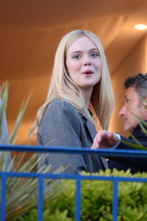 Elle Fanning at balcony of the Martinez Hotel in the evening of the Cannes Film Festival in France 2019/05/13 7