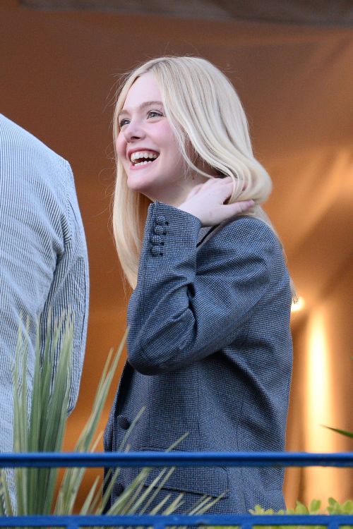 Elle Fanning at balcony of the Martinez Hotel in the evening of the Cannes Film Festival in France 2019/05/13 8