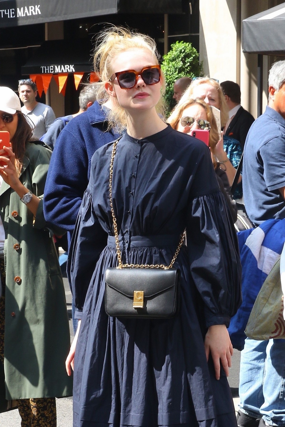 Elle Fanning in a Long Sleeved Navy Blue Dress Out in New York 2019/05/04