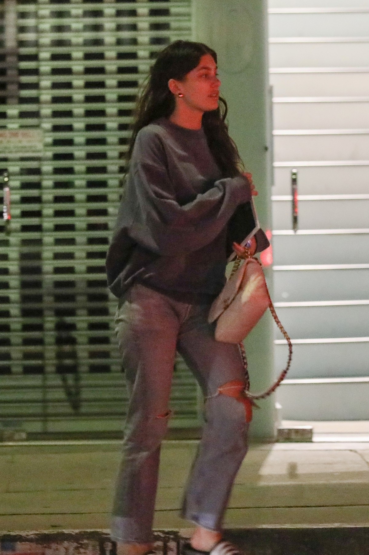 Camila Morrone in Sweatshirt and Ripped Jeans at a Mini Mart in Hollywood 2019/11/26