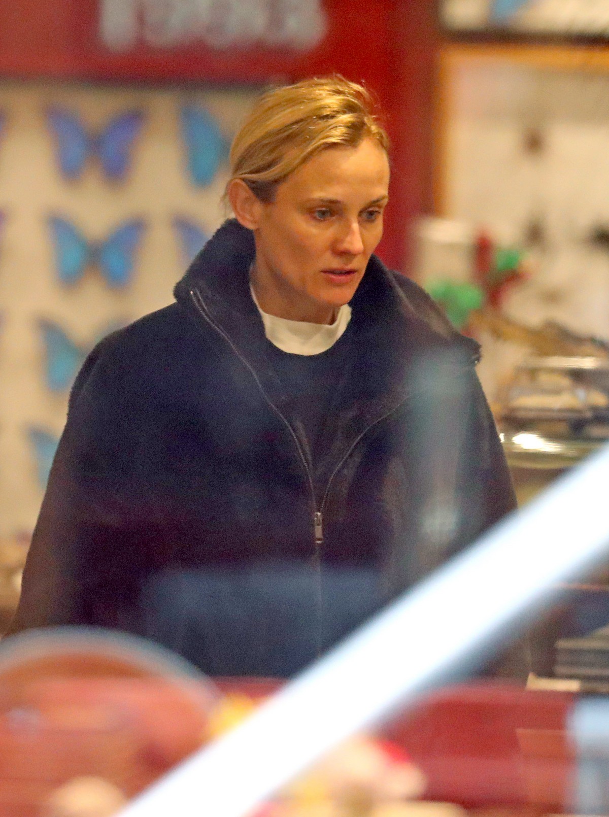 Diane Kruger seen in Black Hoodie and White Bottom Christmas Shopping out in New York City 2019/12/18