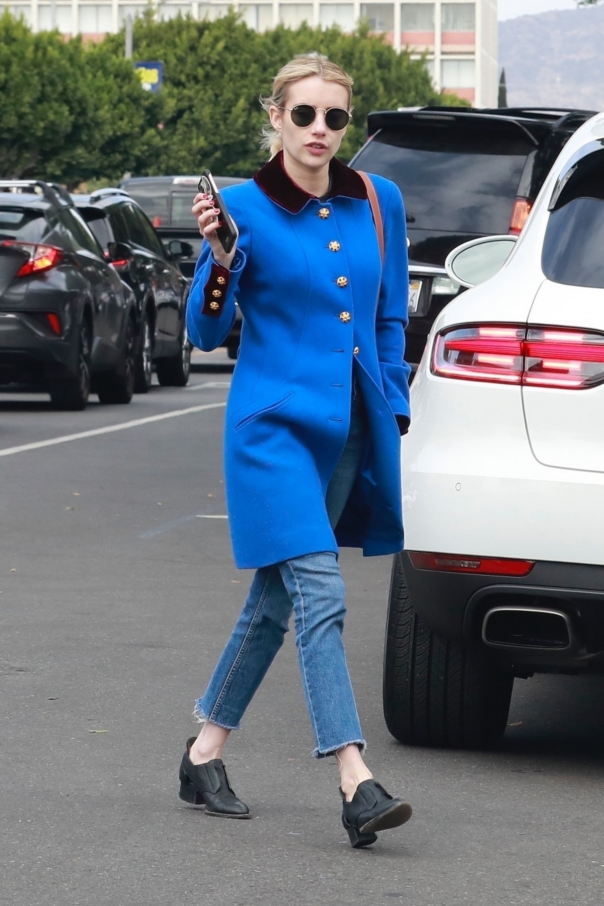 Emma Roberts seen in blue long jacket at adopting a rescue cat in Los Angeles 2020/03/01