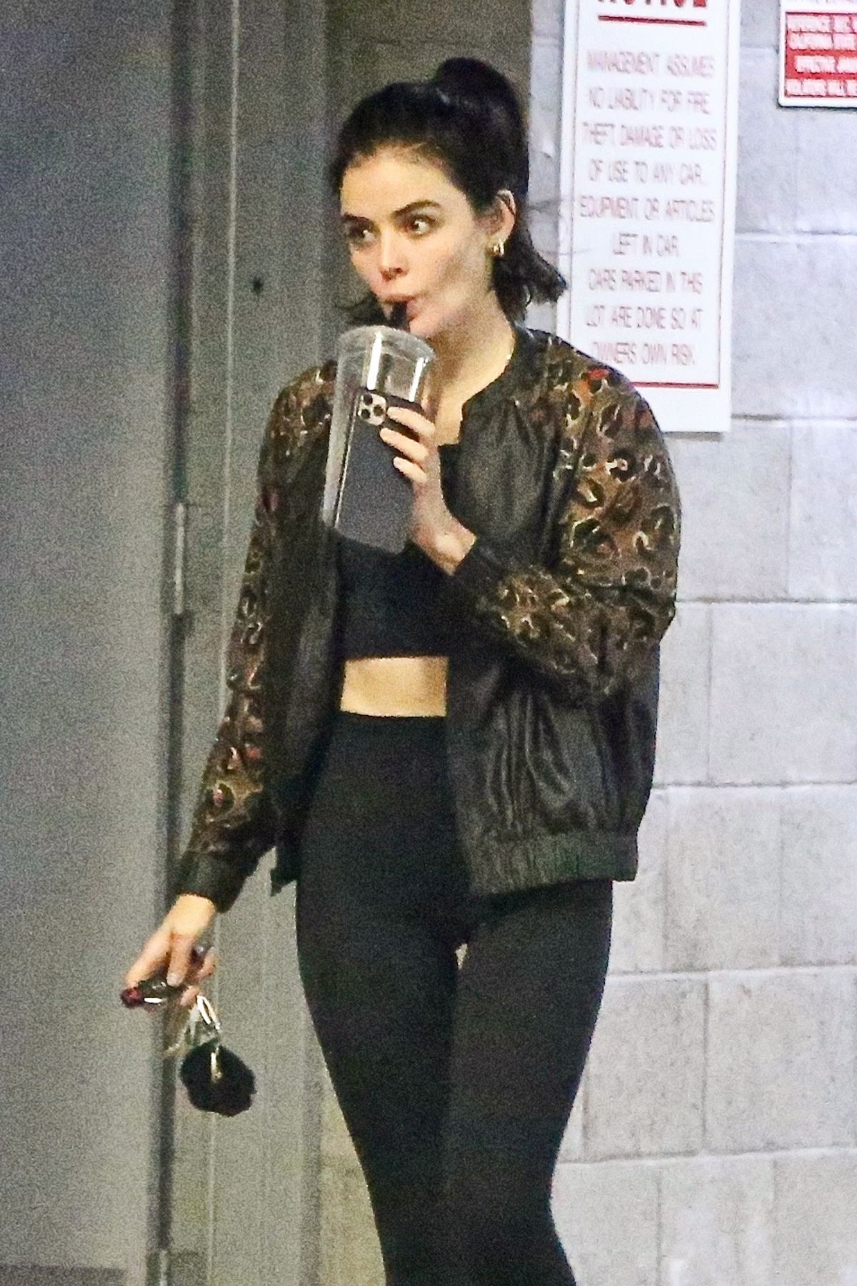 Lucy Hale enjoys her drink after a private training session in Los Angeles 2020/04/10