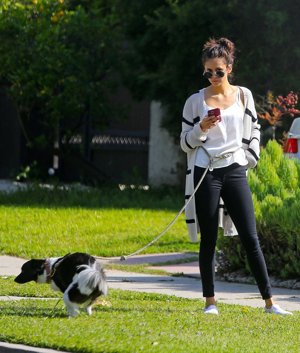 Nina Dobrev out for a walk her dog in Los Angeles, California 2020/04/07