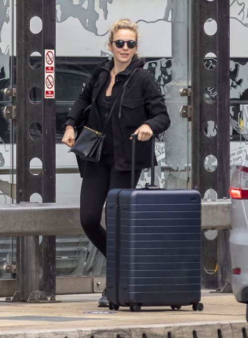 Jodie Comer seen in Black Jacket with Tights at a Train Station in Liverpool 2020/05/31 2