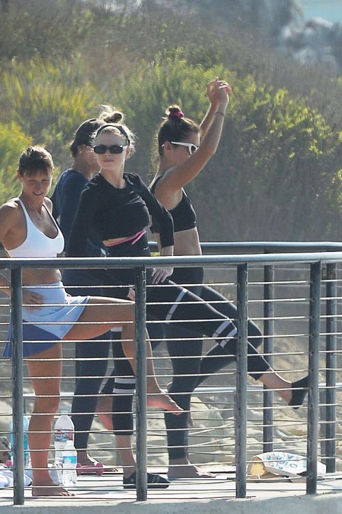 Charlotte McKinney Doing Yoga with Friends at a Beach in Malibu 2020/09/23