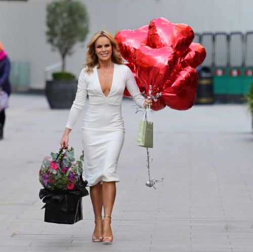 Amanda Holden in White Outfit and Holds Heart Shape Balloon of Her 50th Birthday in London 02/12/2021 6