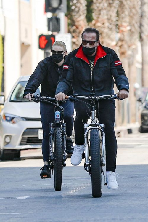 Heather Milligan and Arnold Schwarzenegger Day Out Riding Bikes in Santa Monica 03/13/2021 4