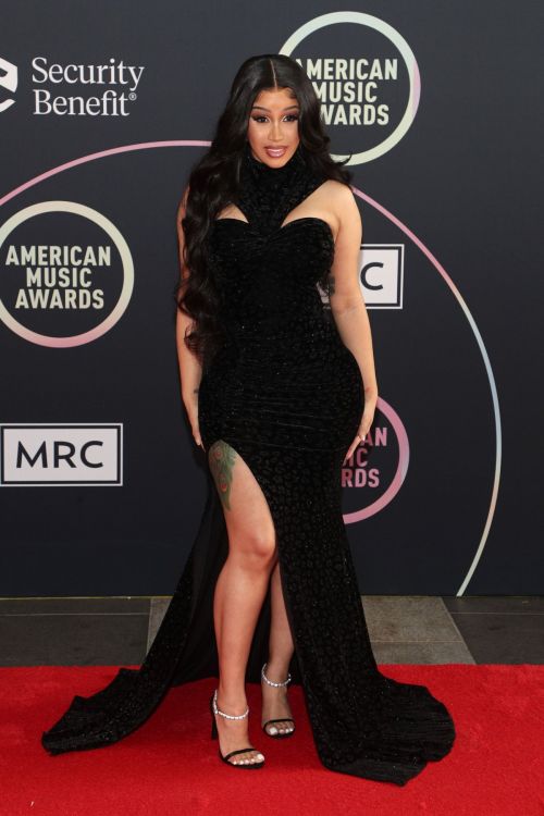 Cardi B seen in Black Dress attends 2021 American Music Awards in Los Angeles 11/19/2021 7