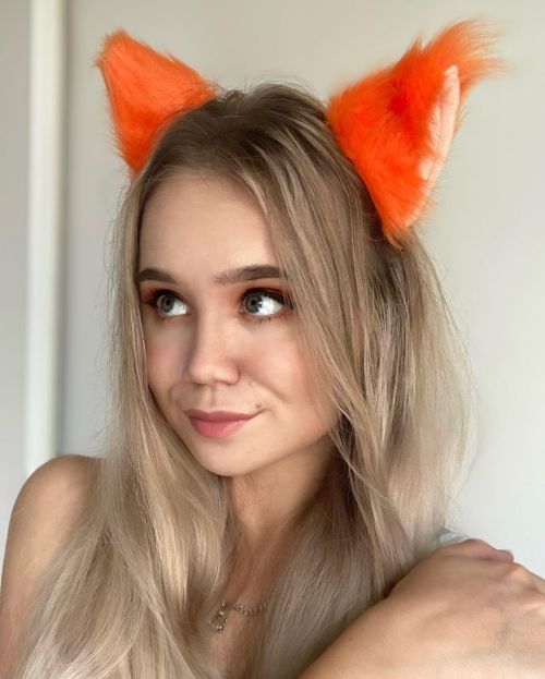 Alisa Goldfinch in White Tank Top with Fox Hairband - Instagram Photos, December 2021 1