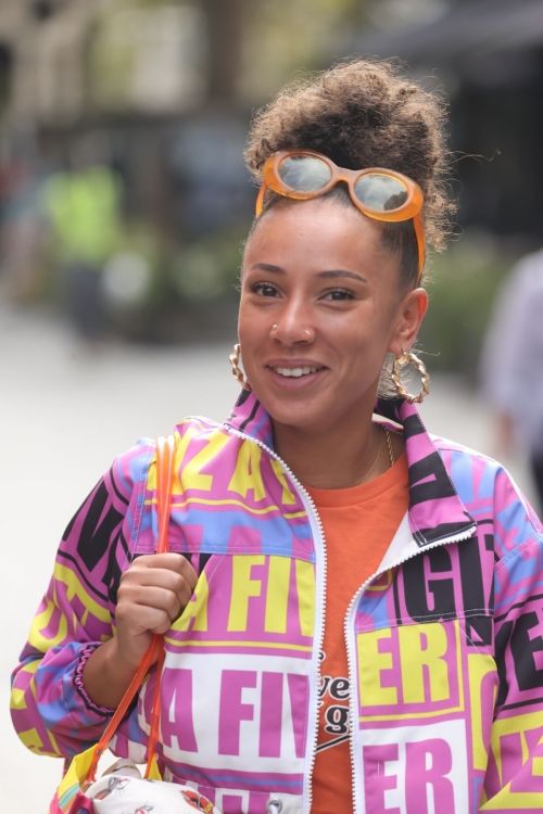 Eliza Rose in Orange Lower with Typography Jacket After Leaves Heart Radio in London 6