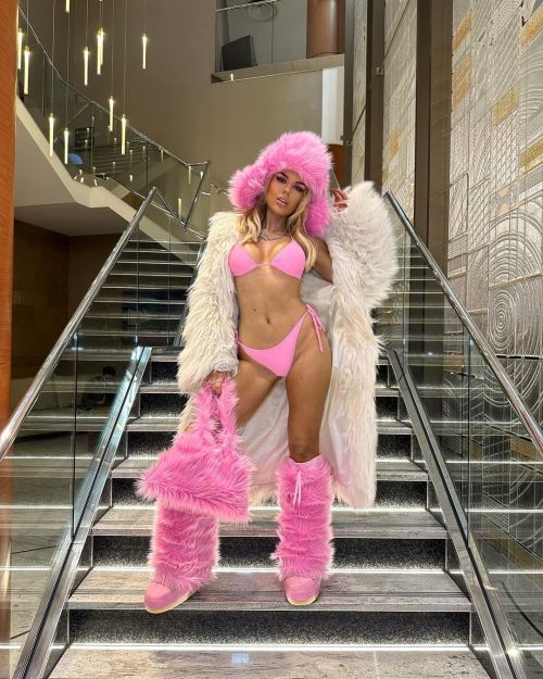 Tallia Storm poses in Tiny Pink Bikini and Fur Coat at Brit Awards 2023 in O2 Arena in London 5