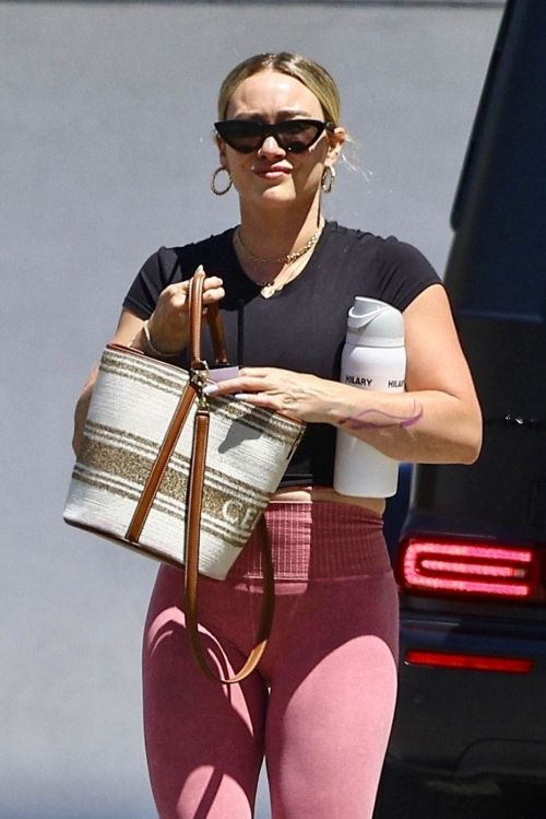 Hilary Duff Workout Attire Black Top and Light Pink Tights 07/15/2023 2