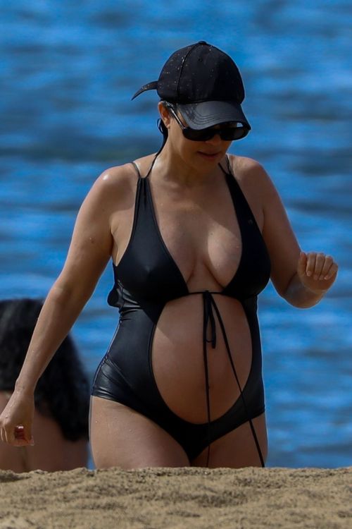 Kourtney Kardashian Flaunts Baby Bump in a Black Swimsuit during Beach Getaway in Kauai, Hawaii 1