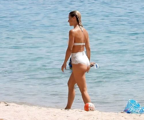 Michelle Hunziker in a White Bikini at a Beach in Sardinia 3