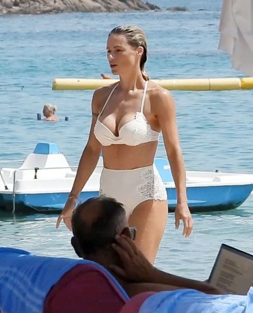 Michelle Hunziker in a White Bikini at a Beach in Sardinia 4