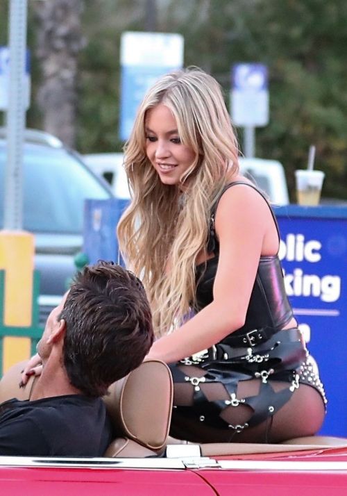 Sydney Sweeney Cruises Sunset Blvd in a Classic Convertible Mercedes-Benz at a Photoshoot in Los Angeles 07/22/2023 5