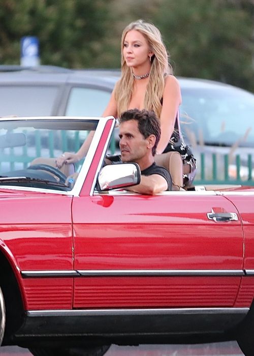 Sydney Sweeney Cruises Sunset Blvd in a Classic Convertible Mercedes-Benz at a Photoshoot in Los Angeles 07/22/2023 7