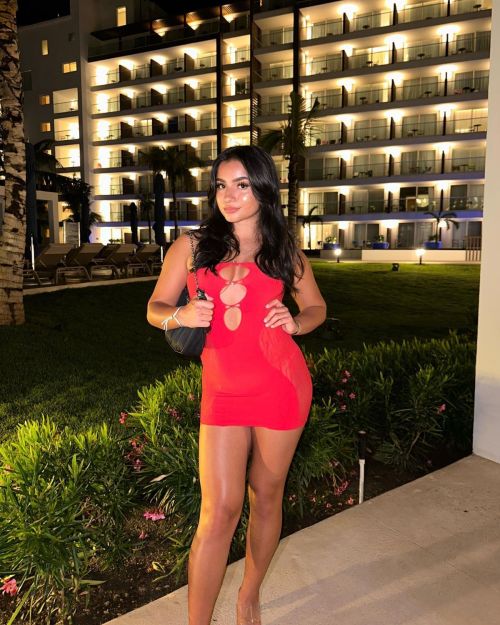 Tati McQuay Stuns Instagram with Her Toned Legs and Red Short Dress 1