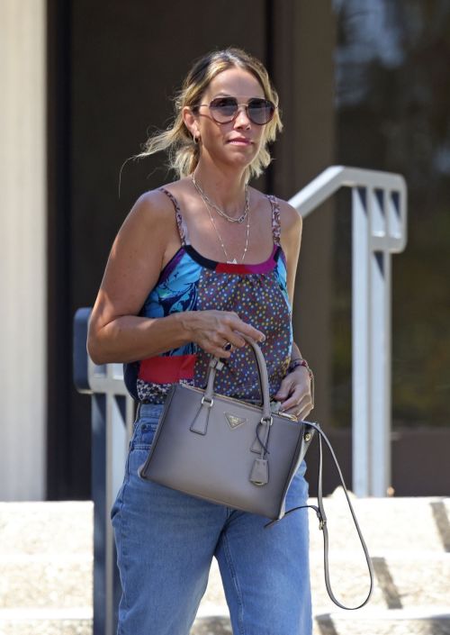 Christine Buamgartner Leaving a Bank Meeting in Santa Barbara 5