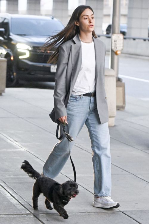 Emmy Rossum Out with Her Dog at JFK Airport in NYC 09/06/2023
