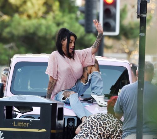 Katie Price Climbs onto a Vivid Pink Car in Liverpool 09/04/2023 1