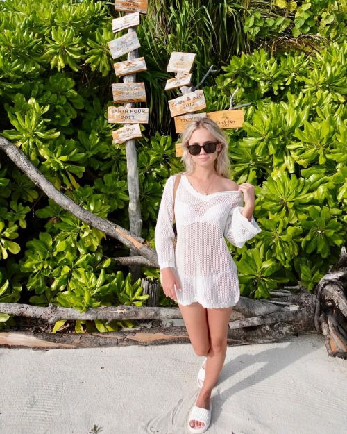Alisa Goldfinch White Outfit Shines in Maldives