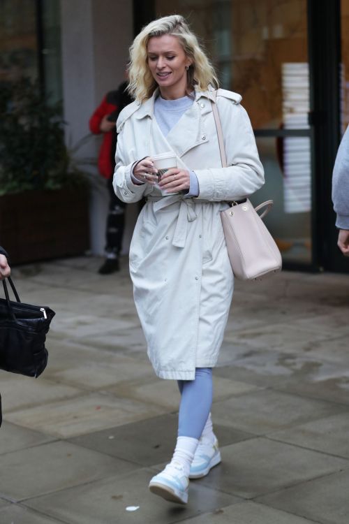 Nadiya Bychkova Chic White Leather Coat and Blue Tights Look 1