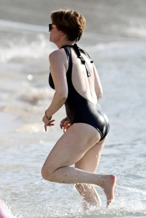 Emma Forbes in a Black Swimsuit at Sandy Lane Hotel Beach, Barbados 1