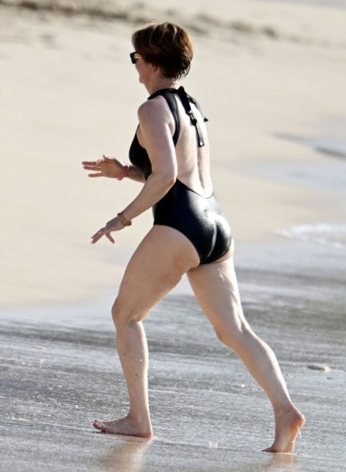 Emma Forbes in a Black Swimsuit at Sandy Lane Hotel Beach, Barbados 6