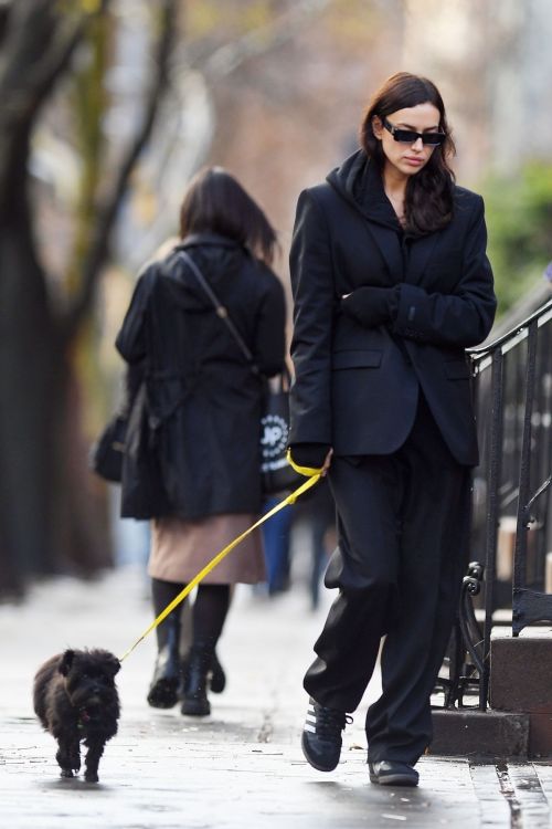 Irina Shayk in Stylish Black Suit Pant Outfit Strolling with Dog in NYC 2
