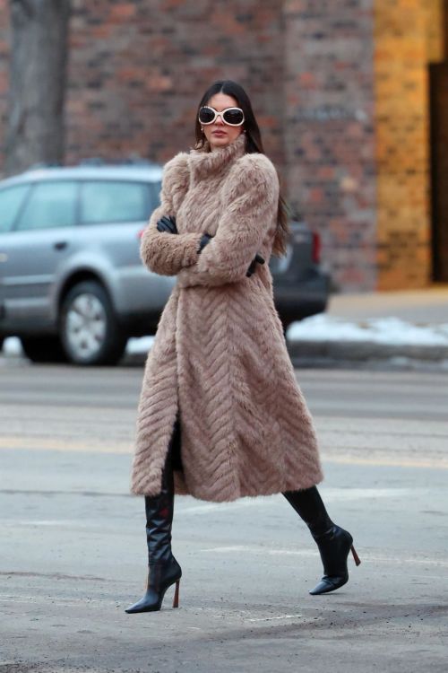 Kendall Jenner in brown fur coat and black boots in Aspen