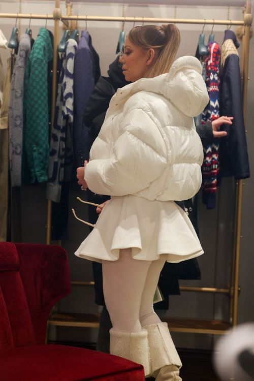 Mariah Carey in White Puffer Jacket and Dress in Aspen 1