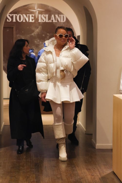 Mariah Carey in White Puffer Jacket and Dress in Aspen 4