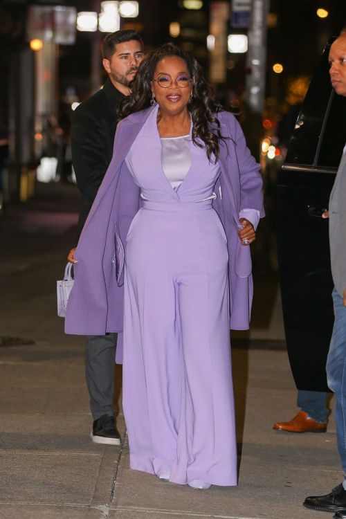 Oprah Winfrey stuns in purple promoting 'The Color Purple' in NYC