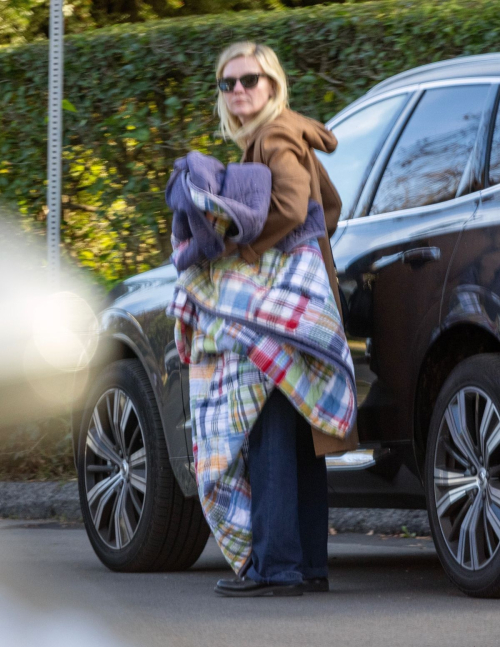 Kirsten Dunst and Jesse Plemons watching their sons play soccer, January 2024 2