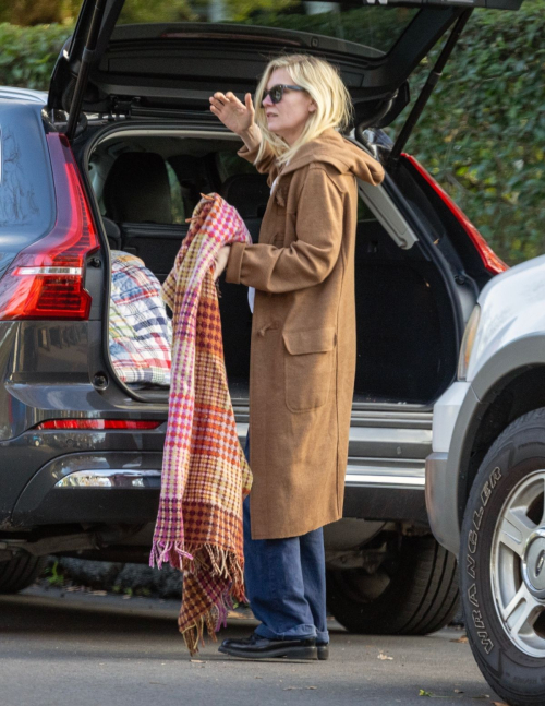 Kirsten Dunst and Jesse Plemons watching their sons play soccer, January 2024 5