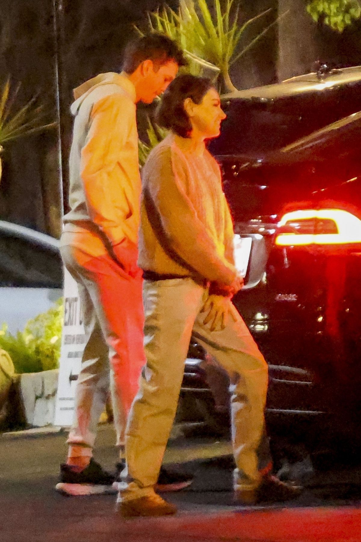 Mila Kunis and Ashton Kutcher Arrive at PINZ Entertainment Bowling in Studio City, December 2023