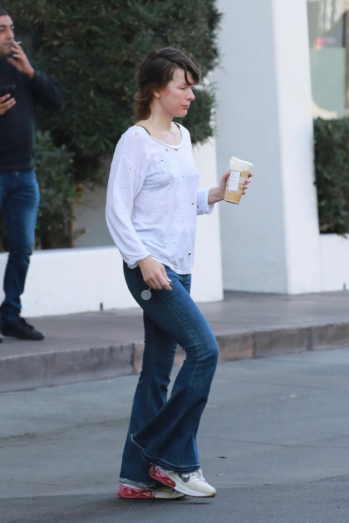 Milla Jovovich at a Starbucks in Los Angeles, January 2024 5