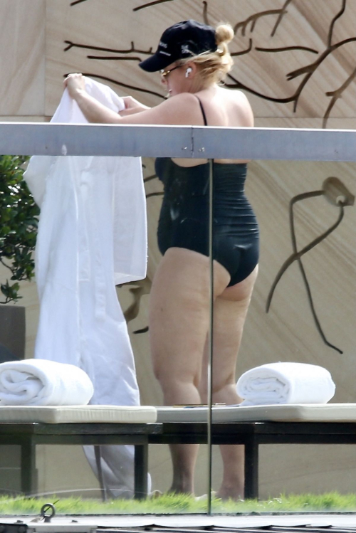 Rebel Wilson in Swimsuit at Sydney Hotel Pool, January 2024 5